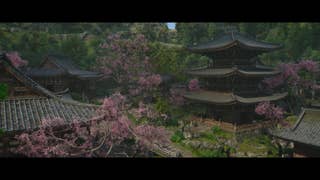 A view of blooming sakura and a traditional pagoda in Spring in Assassin's Creed Shadows.