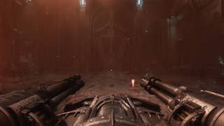 The player aims a turret at a large door in The Siege Part 2 chapter of DOOM: The Dark Ages